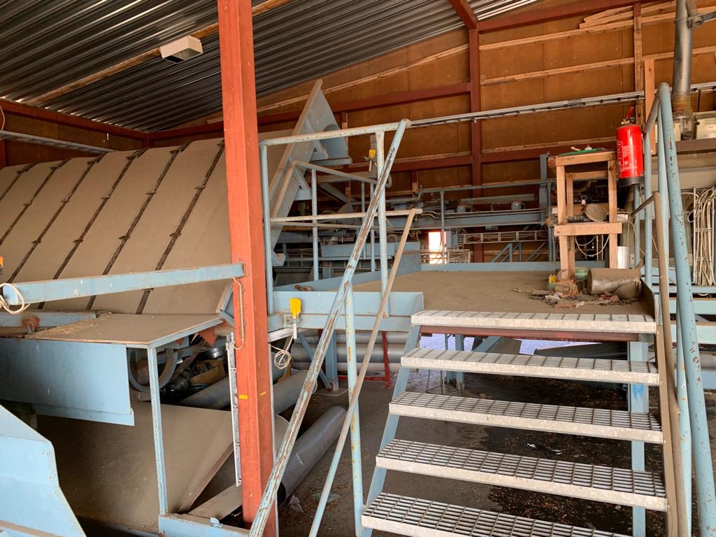 Reiman multirip saw with infeeding and unscrambler Wood Machinery Center