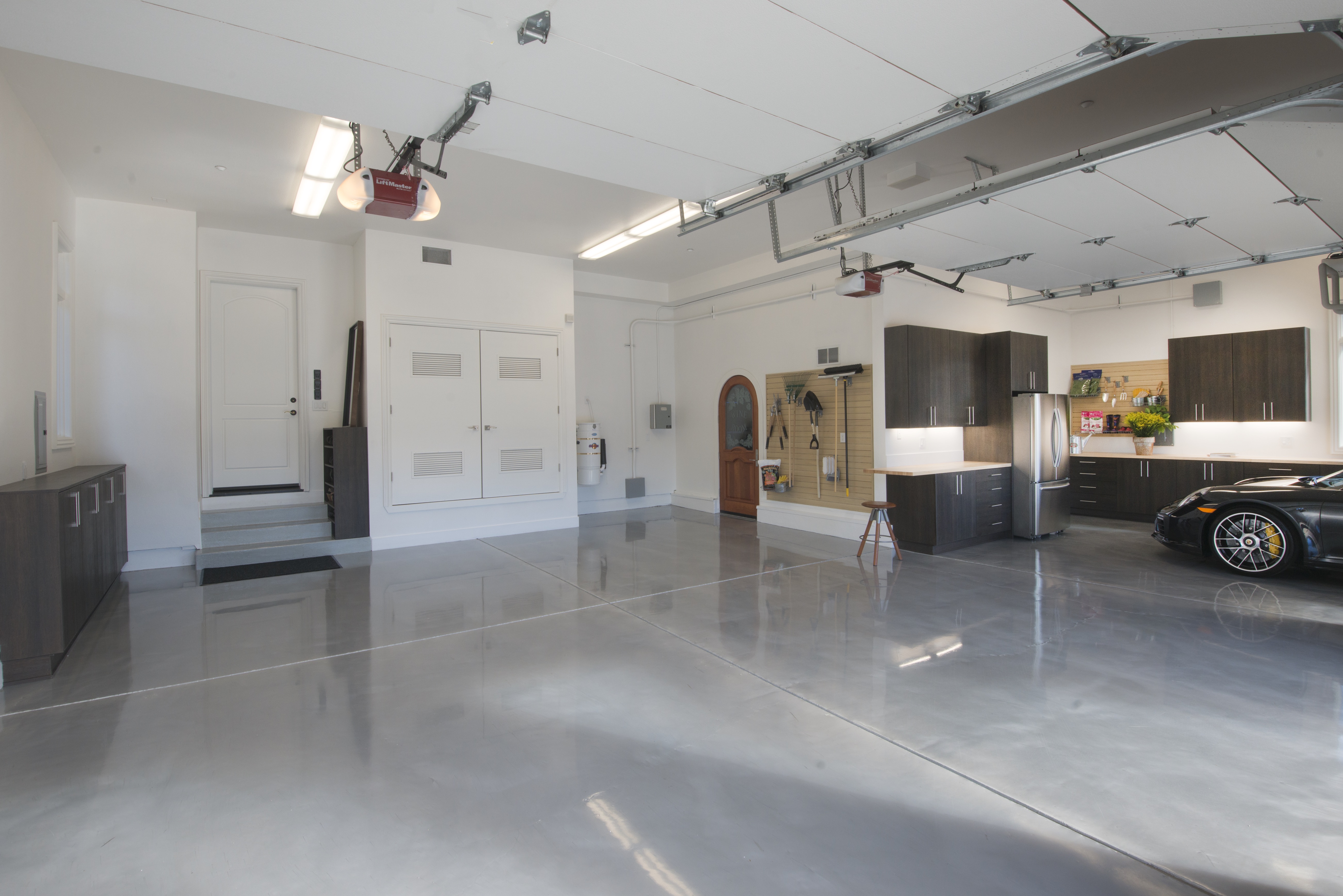 Modern garage design features a kitchen and clever storage