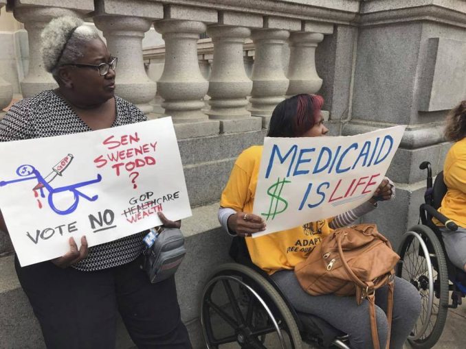 ‘Healthcare Not Wealthcare!’ Disability rights activists arrested