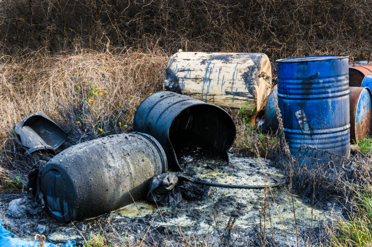 Barrels of toxic waste in nature