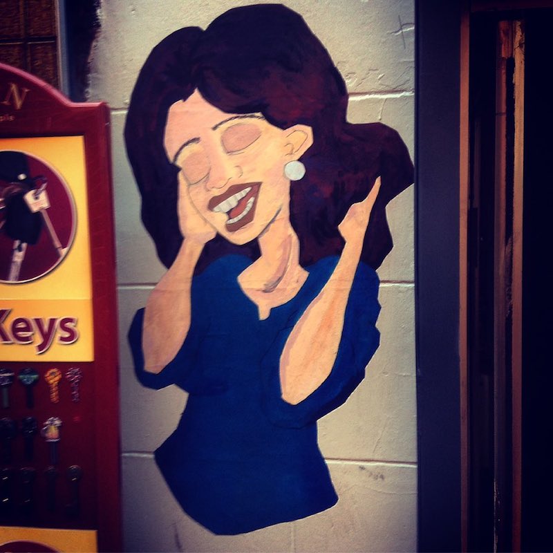 Street art installed on empty shop fronts across town centre by local