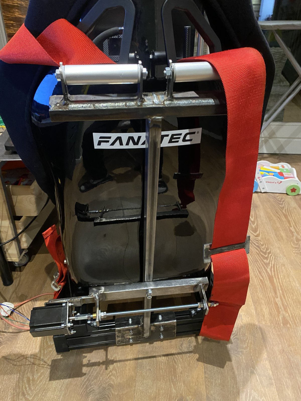 DIY active seatbelt tensioner