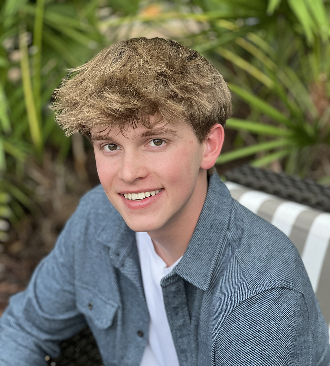 Carmel High School junior trades tennis racket for computer • Current