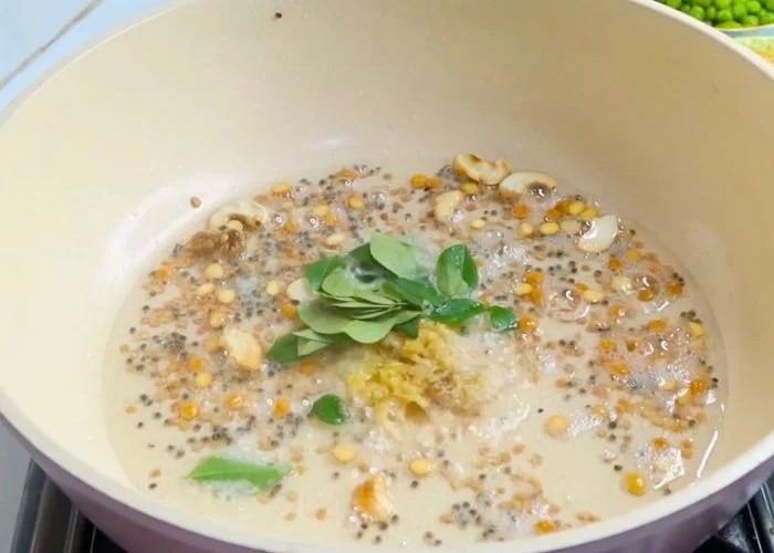 add in curry leaves and grated ginger