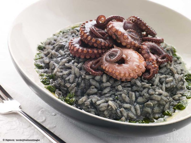 Risotto al nero di seppie Risotto mit schwarzer Tintenfischsoße