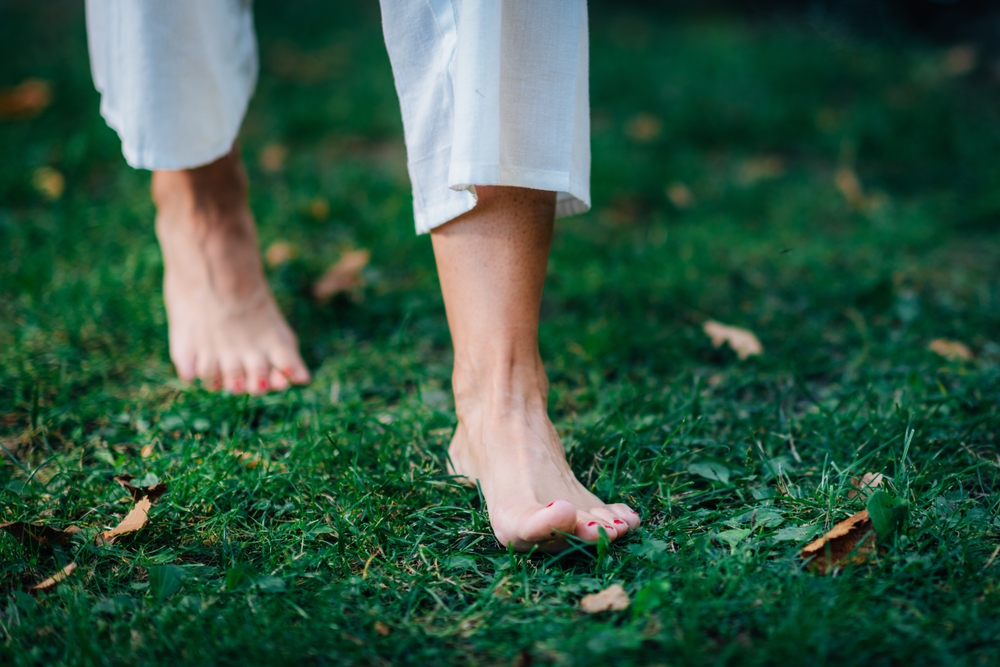 The benefits of grounding how walking barefoot can boost your mood and