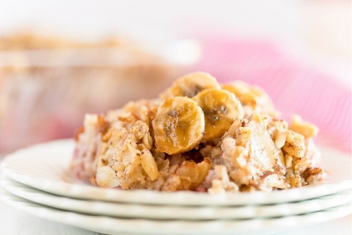 A plate of food with oatmeal on a table.