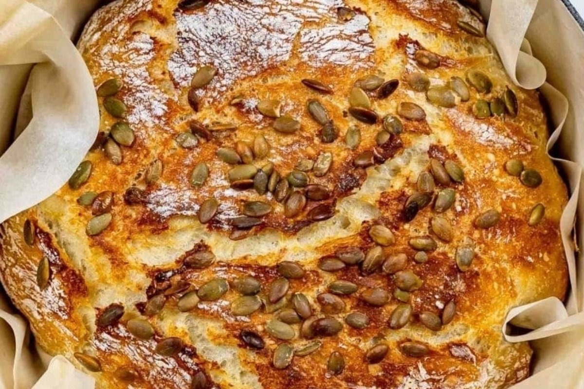 A loaf of pumpkin bread recipes in a baking pan.