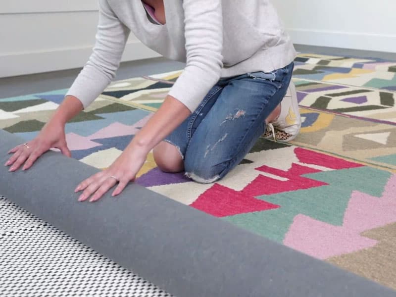 How To Keep Area Rug From Bunching Up On Carpet