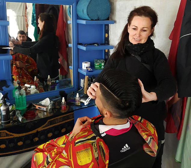 “Messing around in Barzan the barber’s shop. We funded its rebuilding when it burnt down.”