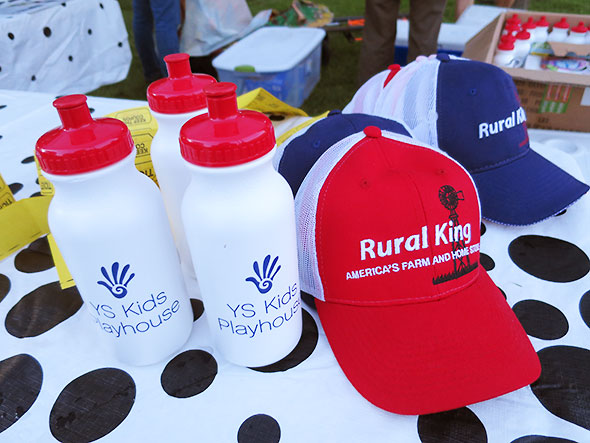Rural King caps and YSKP water bottles