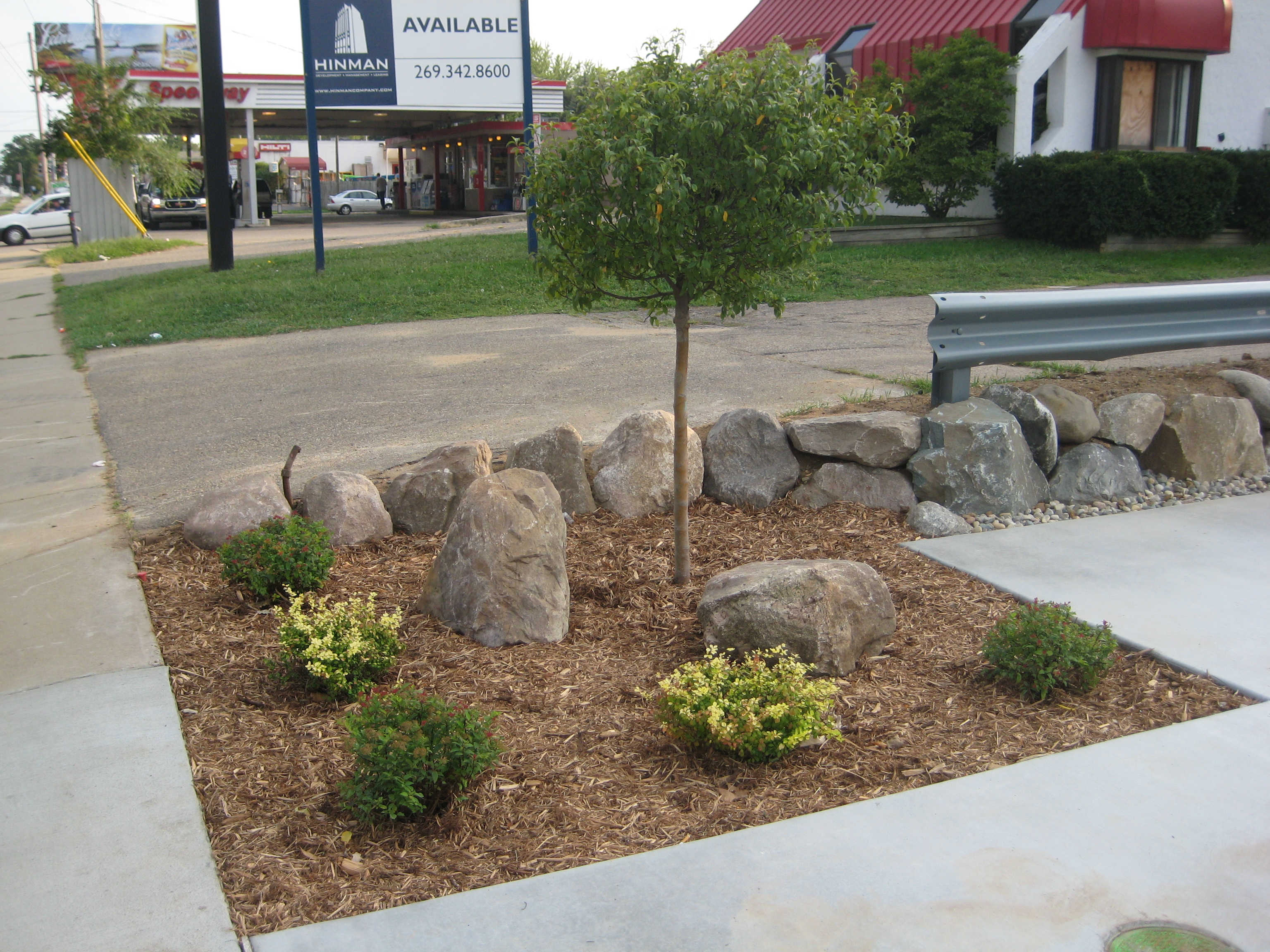 Landscaping and Progress Inside the Garage Ziggy's Auto Sales